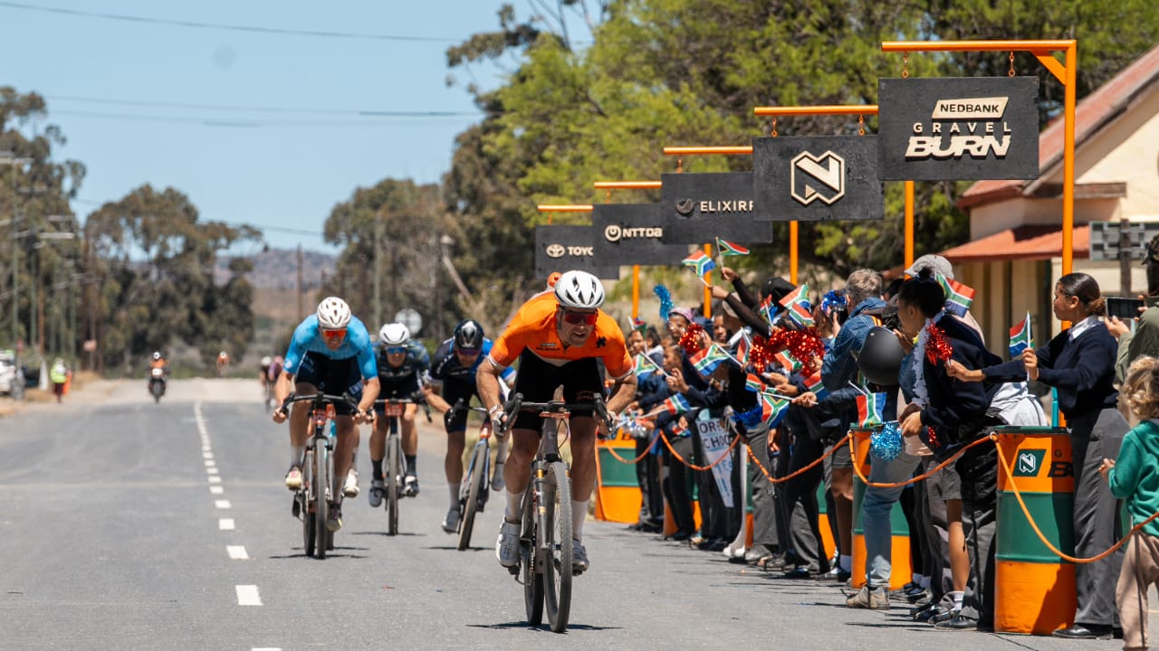 Matt Beers crosses the line on day two of the Gravel Burn race in South Africa.