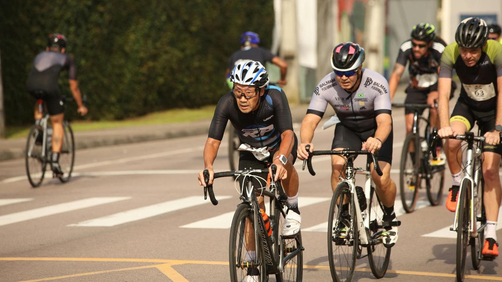 triathlete performing smooth bike mount during race transition in triathlon event