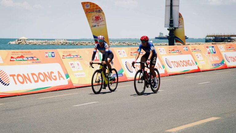 Group of cyclists riding in a competitive road race, illustrating endurance building, stamina training, and preparation for long-distance cycling events.
