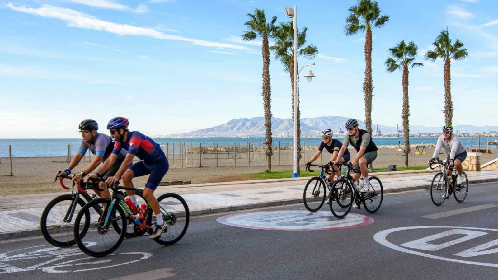 Group of cyclists racing together maintaining high average speed and drafting for performance gains