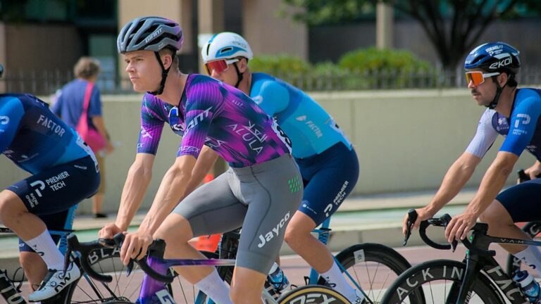 road cyclists riding in formation focusing on positioning and awareness during group ride