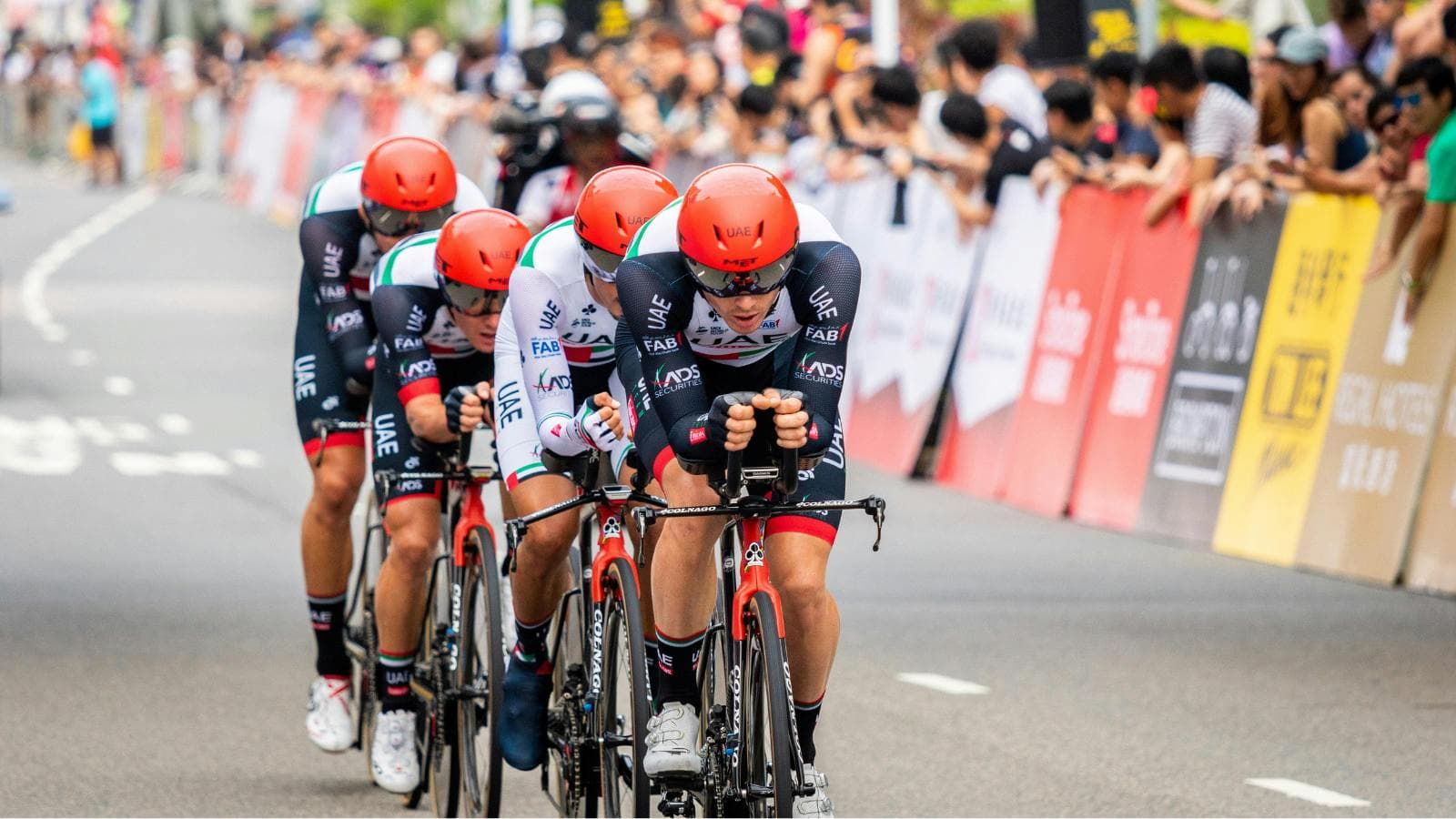 Cyclists racing outdoors maintaining high FTP to fight fatigue during a competitive road race