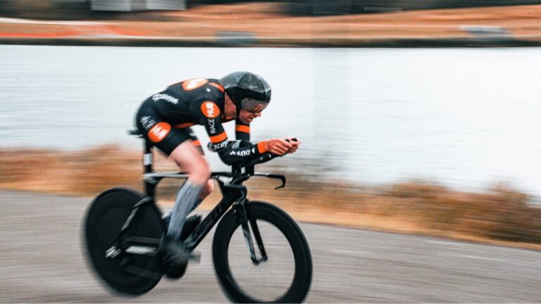 Cyclist maintaining optimal cadence while racing to maximize efficiency and speed