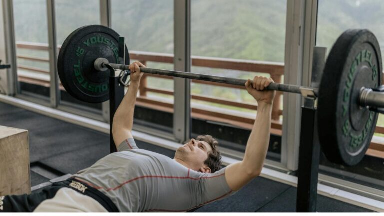 athlete performing interval training on indoor bike to keep workouts engaging and effective