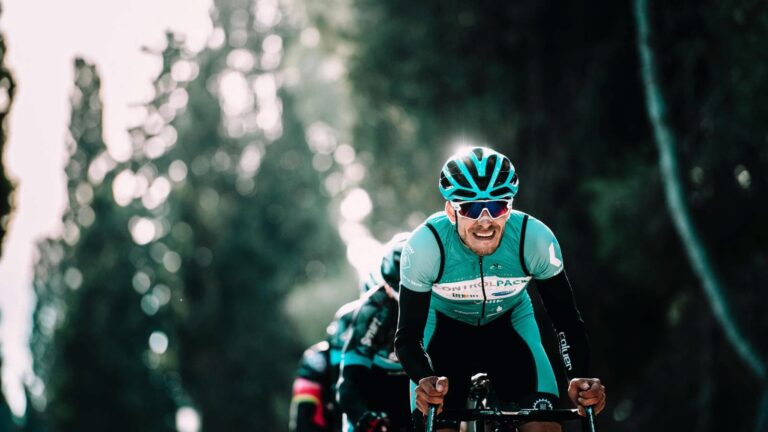 road cyclist maintaining consistent cadence to improve pedaling efficiency and cycling performance