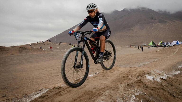new mountain biker practicing bike handling and balance on beginner trail terrain