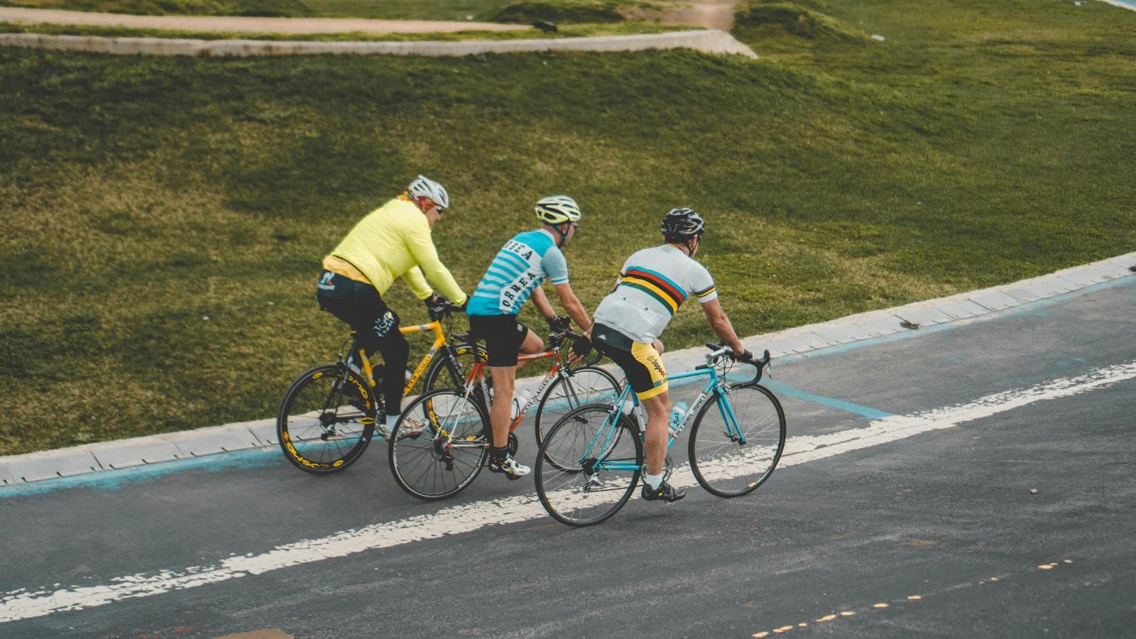 cyclist riding at steady pace during long distance 100km or 100 mile bike ride to maintain endurance