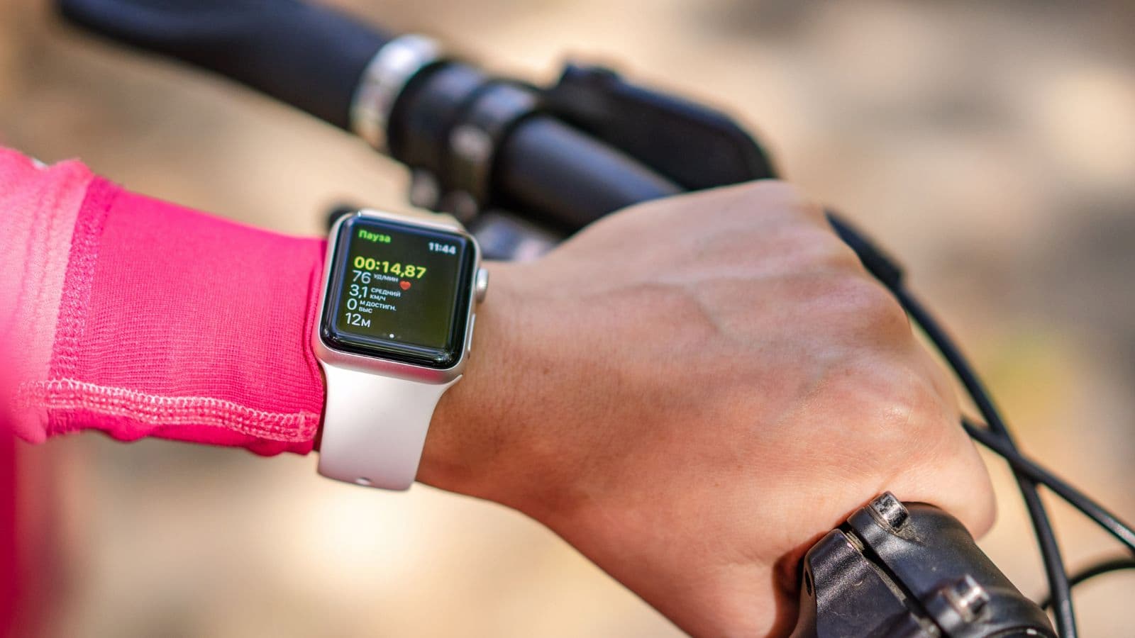 cyclist monitoring heart rate zones during training ride to improve cycling speed and fitness