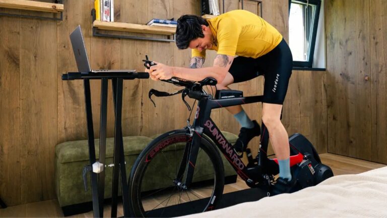 cyclist training on indoor smart trainer year round to improve cycling fitness and endurance