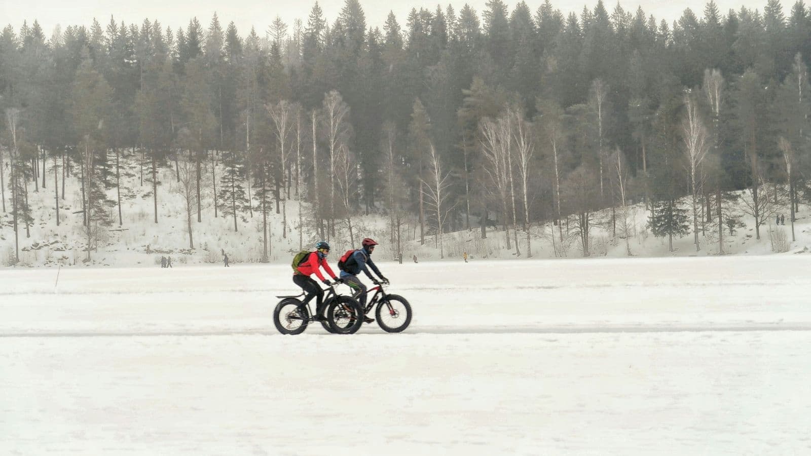 cyclist riding on wet winter road to improve bike handling skills and confidence