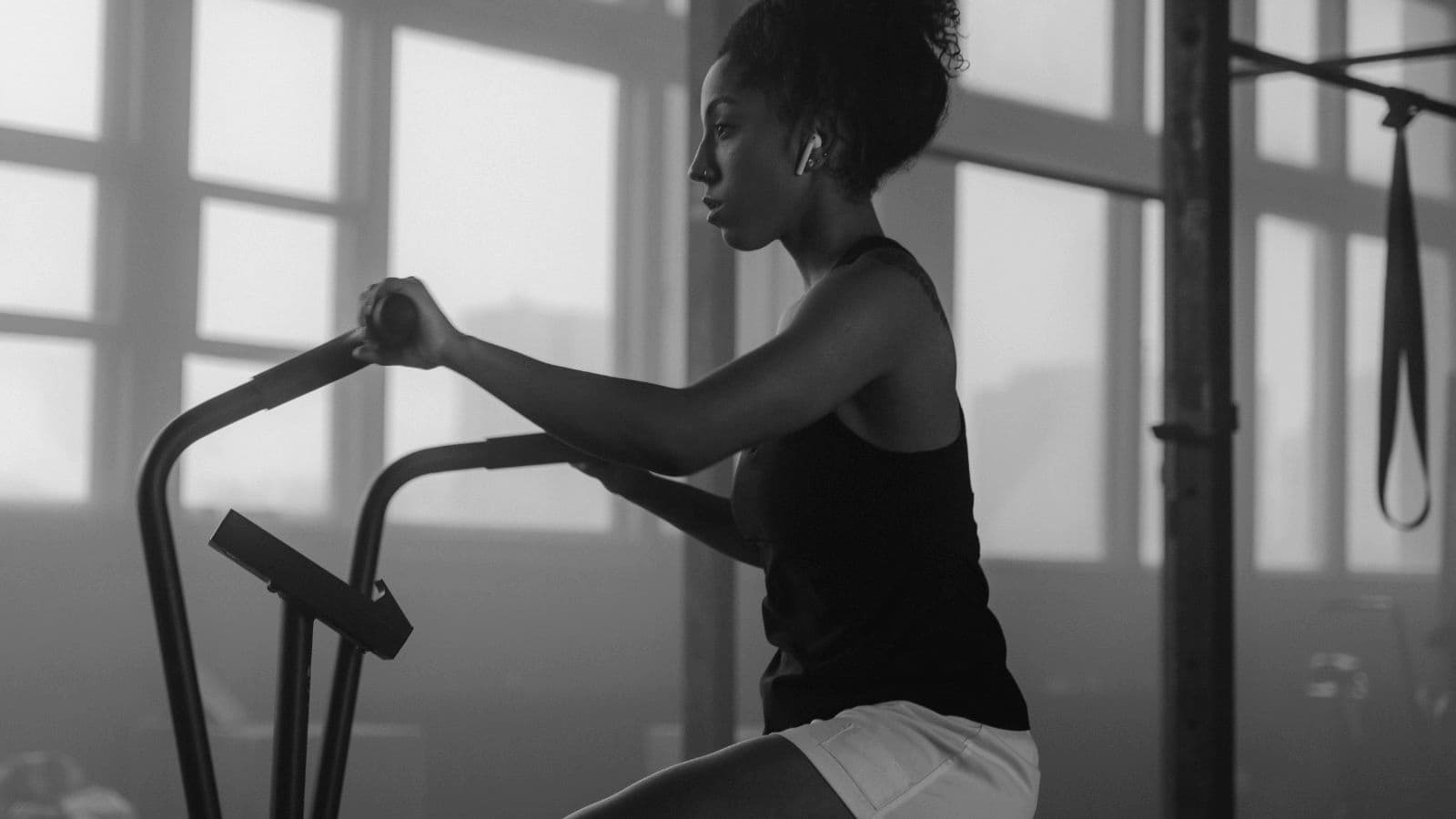 cyclist completing one hour indoor cycling workout on smart trainer to maintain fitness and endurance