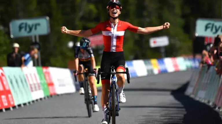 Road cyclists riding quickly together during a group ride that makes maintaining an easy Zone 2 effort difficult and winning the race.