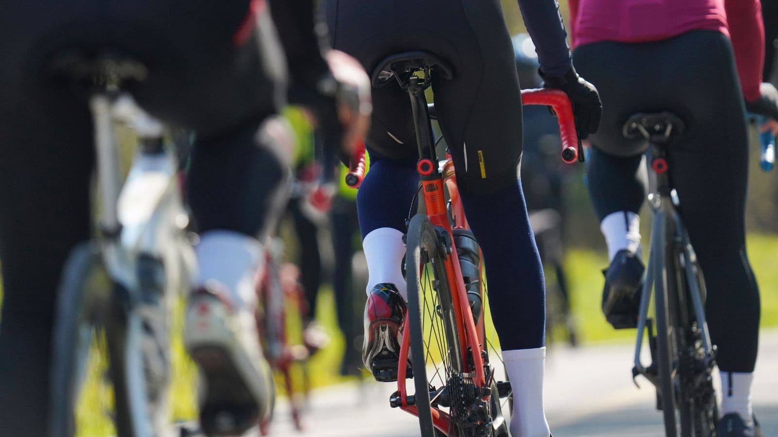 Side view of a cyclist’s foot and ankle maintaining a natural position while pedaling a road bike.